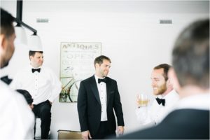 st-augustine-florida-destination-wedding-white-room-groom-groomsmen