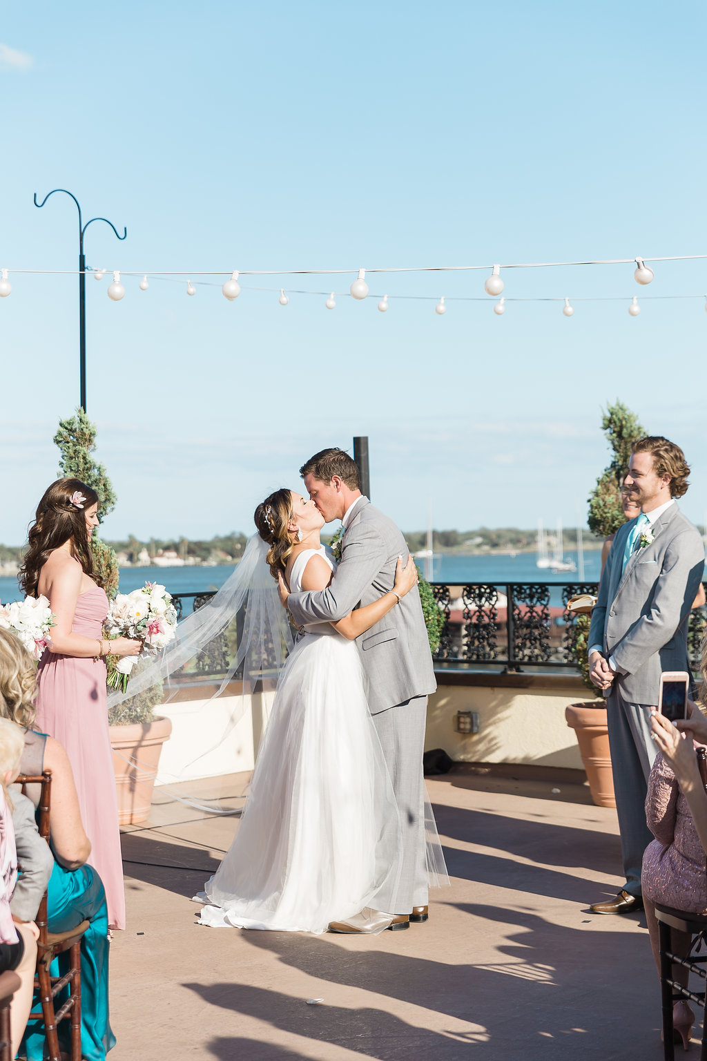 white-room-rooftop-wedding-st-augustine-florida-first-kiss